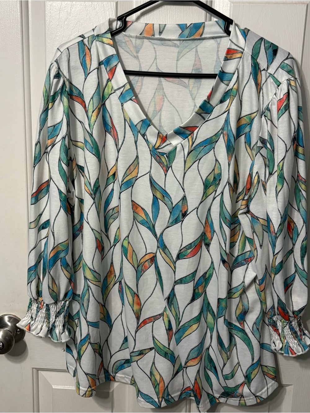 Women’s White V-Neck Blouse with Multicolor Leaf Pattern